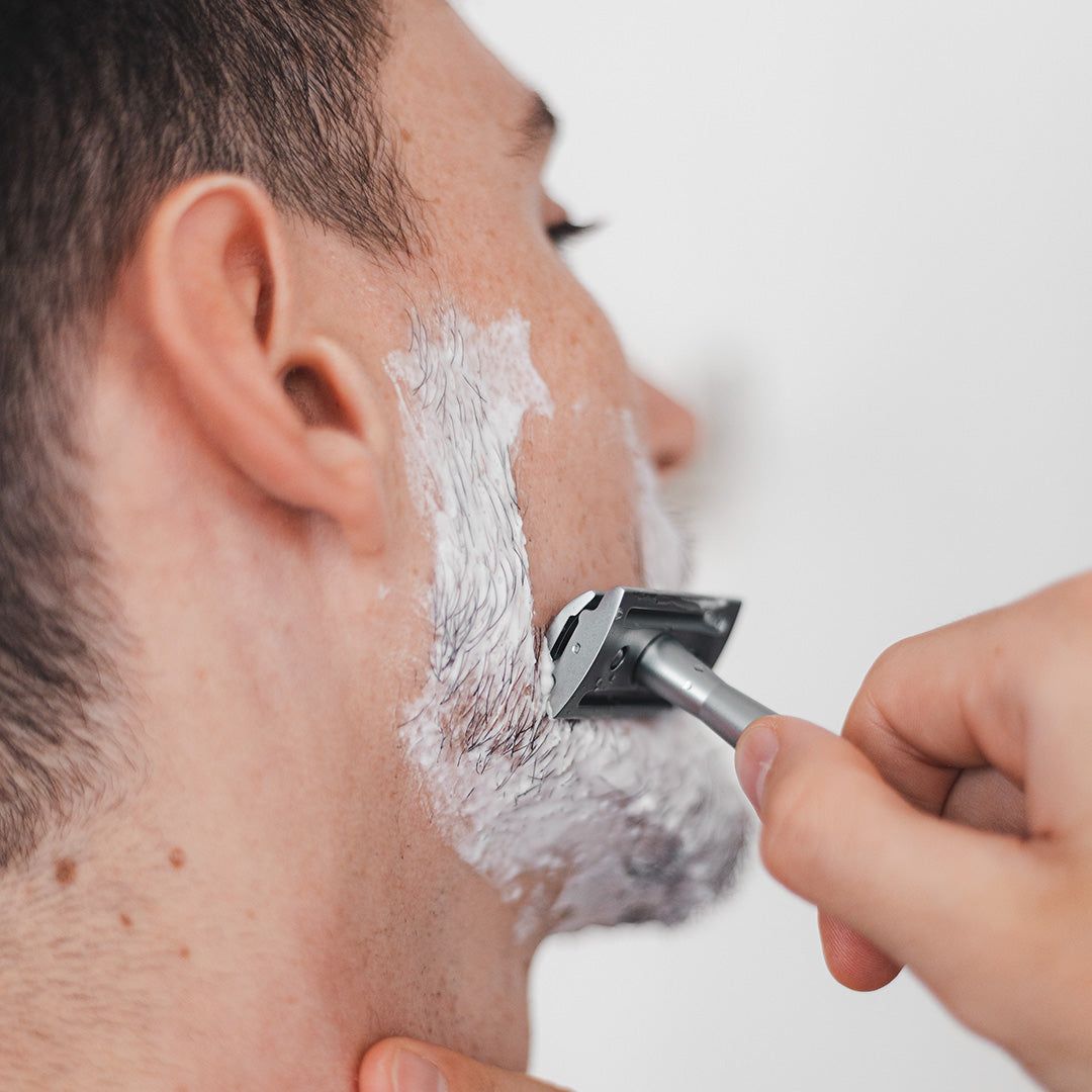 align razor shaving face with cream